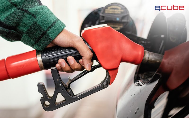 person refuelling a car